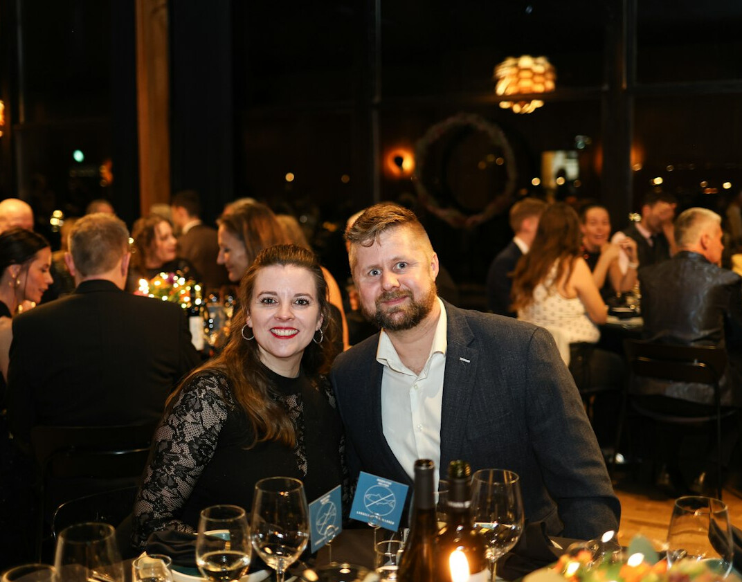 woman smiling at event